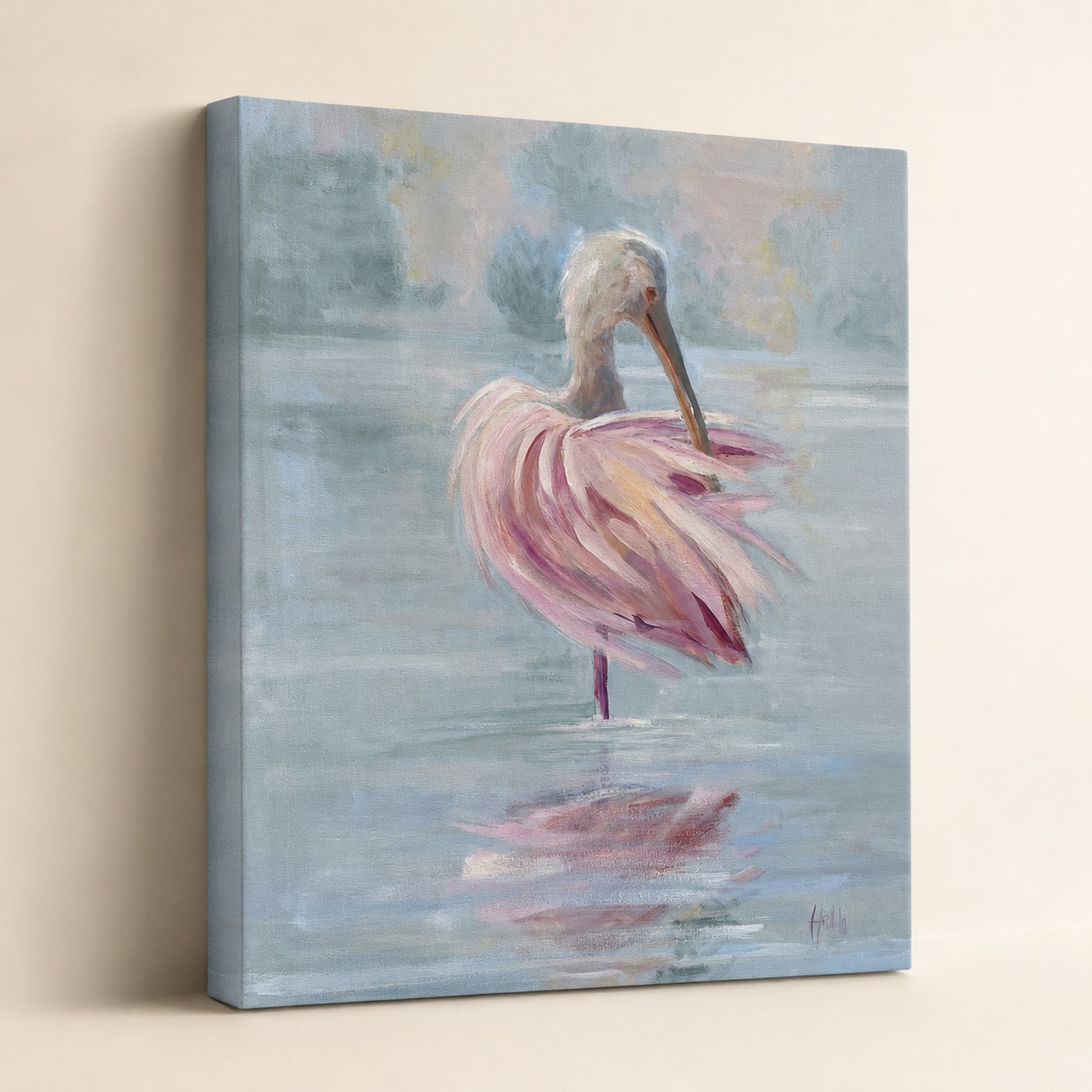 A square canvas wall art print depicting a pink spoonbill standing in calm blue-gray water, shown hanging against a light beige wall.