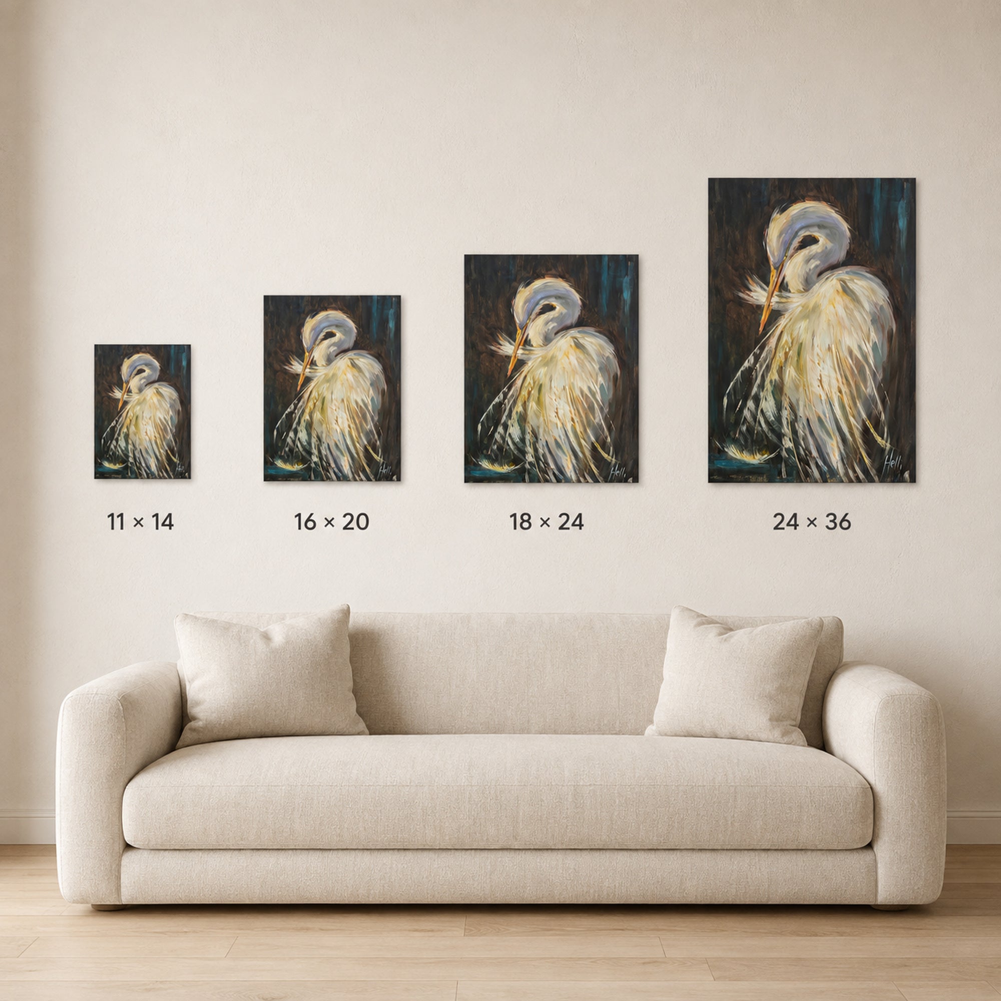 Four framed bird wall art prints in different sizes are displayed above a light beige sofa on a cream wall, with size labels beneath each print: 11 x 14, 16 x 20, 18 x 24, and 24 x 36.