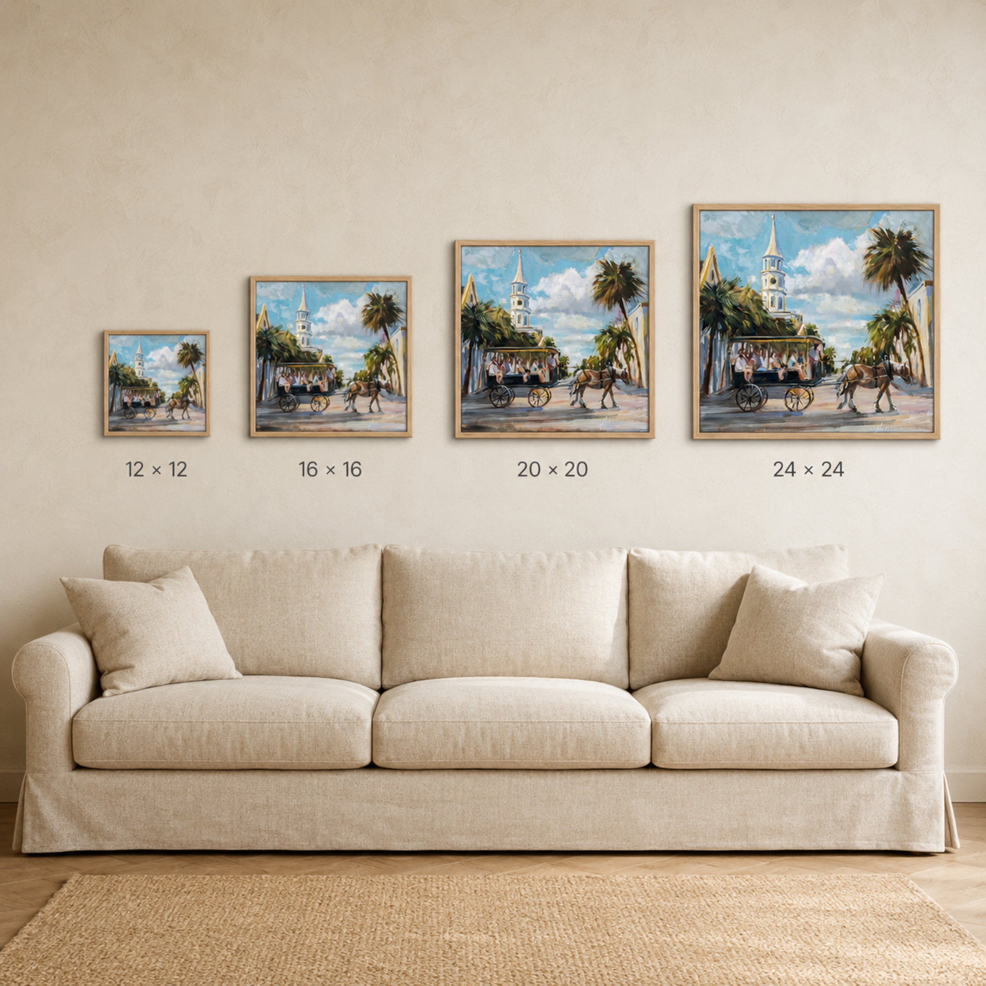 Four framed coastal village paintings in different sizes are displayed on a beige wall above a cream-colored sofa. The paintings depict scenes with palm trees, horse-drawn carriages, and a blue sky.